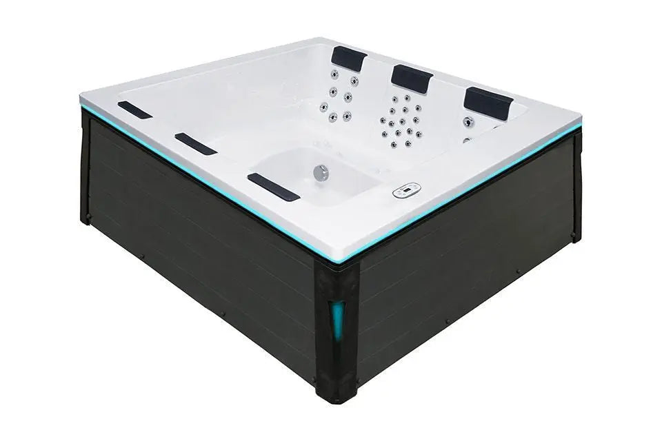 Zes persoons moderne jacuzzi buiten met witte binnenkant en zwarte buitenkant ideaal als zwemspa of swimspa.