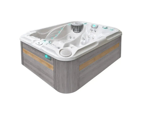 Moderne 3-persoons jacuzzi buiten met grijs paneel en wit interieur, ideaal als zwemspa of swimspa.