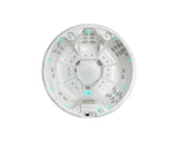 Ronde witte 7-persoons jacuzzi met meerdere jets en ingebouwde bedieningspanelen, perfect als swimspa of zwemspa voor buiten.