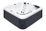 Moderne vijfpersoons jacuzzi buiten met witte kuip en donkere buitenkant, perfect als zwemspa of swimspa, ideaal voor.